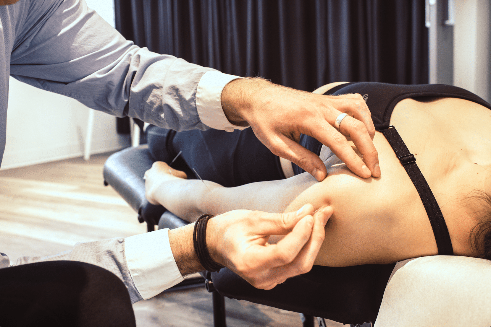 A woman getting acupuncture